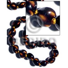 16 pcs. of kukui nuts in high