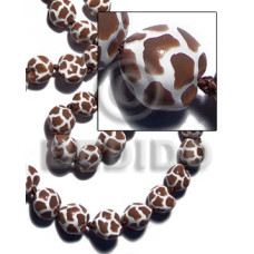 kukui seeds in animal print  giraffe