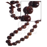 brown kukui nuts ribbon lei ( lumbang