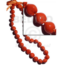 lei  kukui nut in red orange