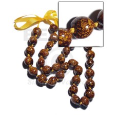 32 pcs. of kukui nuts in high