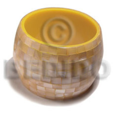 chunky bangle with orange hammershell blocking in