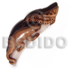 75mm cowrie tiger shell fang ( varying natural sizes ) with clay