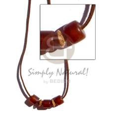 leather thong with 3 pcs. horn amber