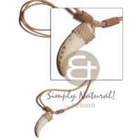 cowrie fangs with palmwood tube in wax