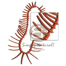 coral colored graduated coco indian tusks with